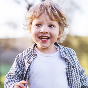 Smiling child outdoors