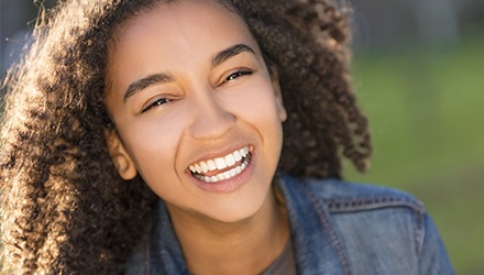 Smiling teen girl outdoors