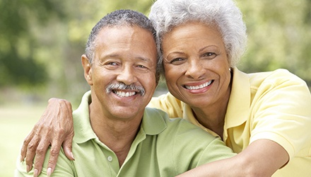 Smiling older man and woman