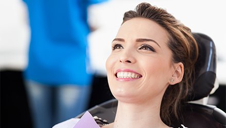 Smiling woman in dental chair