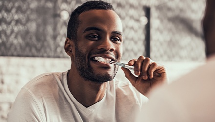 Man brushing his teeth